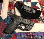 Smith and Wesson M&P Shield .40 caliber with green Crimson Trace laser